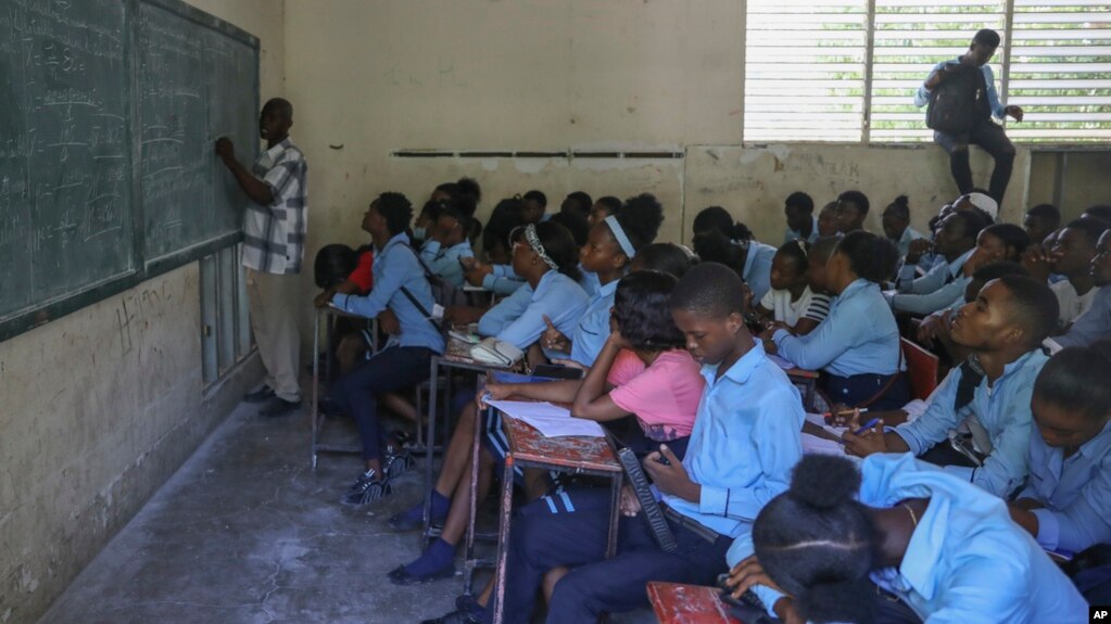 Students attend a math class at the Jean Marie Vincent High School in Port-au-Prince, Haiti's education